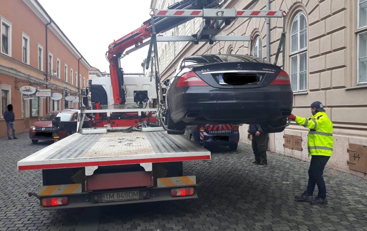 În ce situații poate fi ridicată o mașină de către autorități chiar dacă e parcată legal