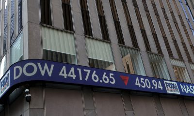 Economiștii avertizează că taxele vamale și incertitudinea vor încetini creșterea economică și vor accelera inflația în SUA